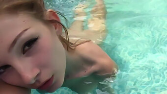 Girl Pleasures Herself In Swimming Pool